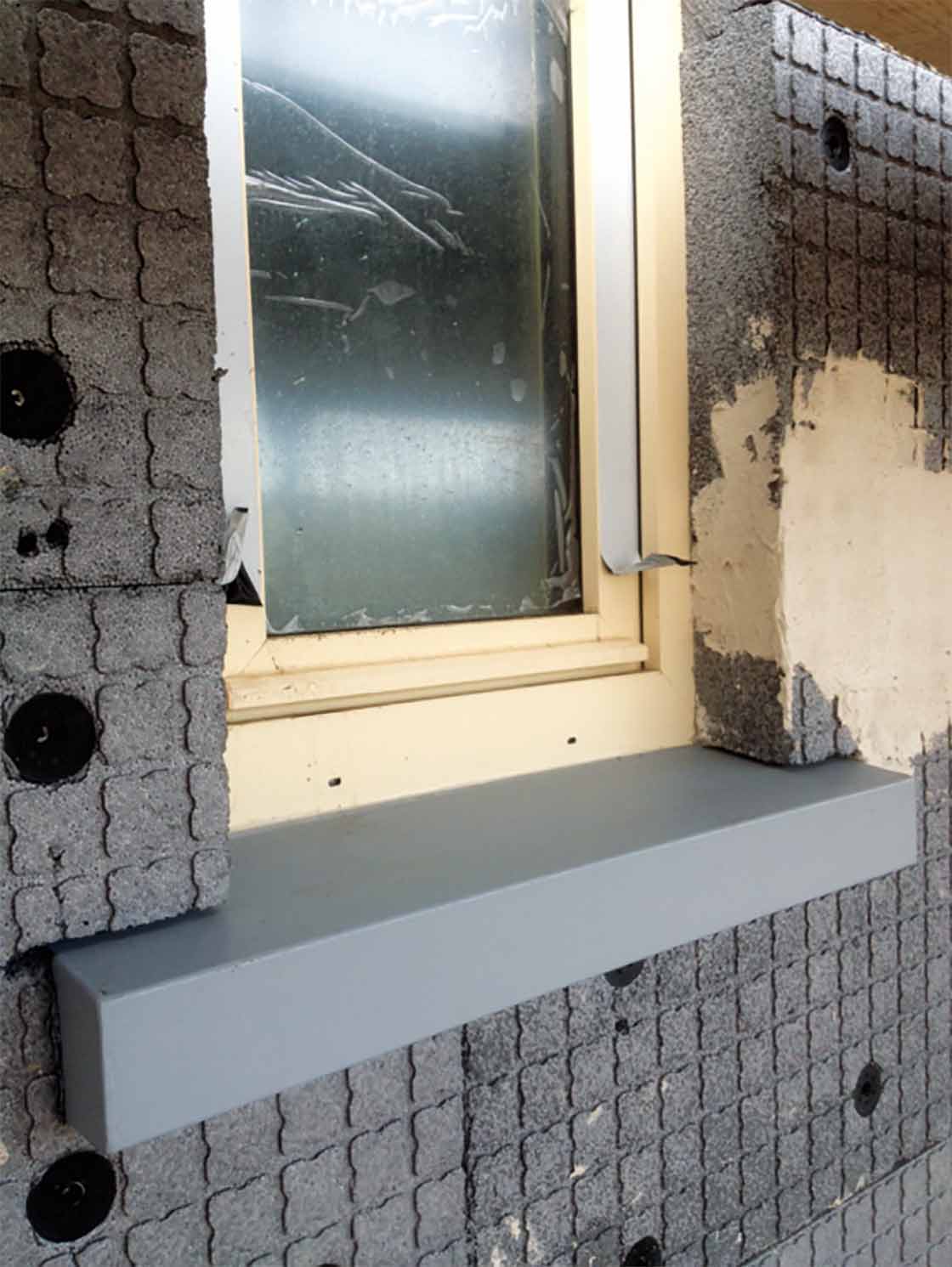 To further lower the U-value of the walls to meet passive house standards, an extra 100mm of Neopor was fixed externally
