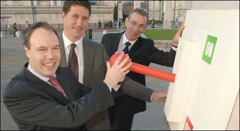 NI Energy Minister, Nigel Dodds, ROI Energy Minister, Eamon Ryan and EU Energy Commissioner, Andris Piebalgs, marking the successful completion of the Single Electricity Market. NI Energy Minister, Nigel Dodds, ROI Energy Minister, Eamon Ryan and EU Energy Commissioner, Andris Piebalgs, marking the successful completion of the Single Electricity Market.