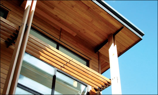 A cedar brise soleil reduces glare inside the building A cedar brise soleil reduces glare inside the building
