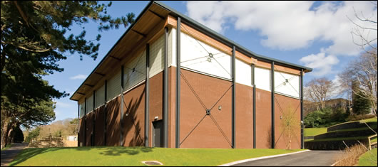 the new blockwork building is multi-functional - combining art, technology and design teaching facilities with a sports centre and dance hall the new blockwork building is multi-functional - combining art, technology and design teaching facilities with a sports centre and dance hall
