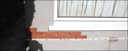 The brick slip finish by Homeglo being applied to the newly insulated walls on the ground floor The brick slip finish by Homeglo being applied to the newly insulated walls on the ground floor