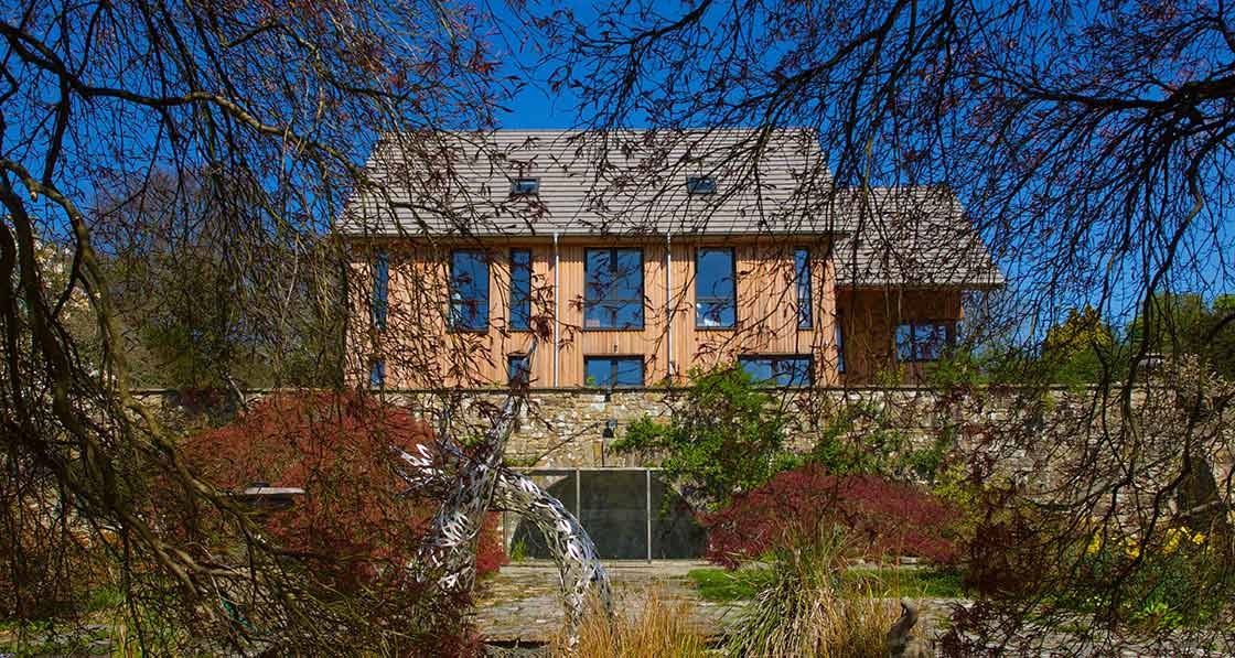 Larch-clad passive house inspired by a venn diagram